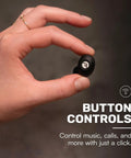 Hand holding Everyday Classic Bluetooth Earbuds With Mic And Active Noise Cancellation For Immersive Sound On The Go Sweat And Water Resistant All Day Battery Up To 32 Hours Of Playtime Comfortable Wireless Earbuds In Black