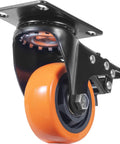 Heavy Duty Three Inch Swivel Caster Set With Slick Rolling Non Marking Pvc Wheels Dual Ball Bearings Built Tough Ab Lock Brakes and Reinforced Carbon Steel Plates close-up of swivel caster with orange wheel and metal plate