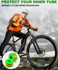 Cyclist on mountain bike with Bike Tire Liners Self Adhesive Inner Tube Protector For Mountain Bikes Puncture Free Shield Image