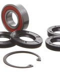 Beefed Up Drive Shaft Housing Rebuild Kit With 2 Heavy Duty Bearings, 4 Oil Seals And Retaining Ring, Direct Replacement For OEM 92049-3707, 92050-502, 92050-503 And 92045-0113, Fits Wide Range Of ATV UTV Drivetrains; bearings and seals on white background