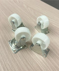 Hella Tough Eight Piece Heavy Duty Casters With Secure Locking Brakes And Smooth White Plate Mount Wheels Optimized For Furniture That Glides Like A Charm Today. White plate mount casters with rubber wheels, ideal for smooth furniture movement.