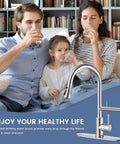 Premium Brushed Nickel Filtered Water Kitchen Faucet Featuring Smooth Pull Down Sprayer And Dual Flow Settings For Hectic Daily Household Cleaning with family enjoying purified water.