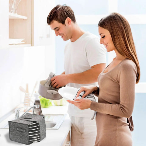 Couple in a kitchen using the Road Ready Felt Plate Organizer And Campervan Cabinet Game Changer, Knockout Eight Slot Dinnerware Holder In Clean Gray.