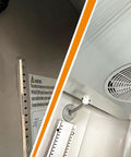 Interior view of Top Shelf Commercial 3 Door Reach In Refrigerator, Built Tough Stainless Steel with cooling fan and lighting.
