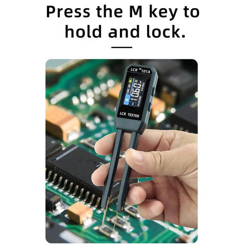 Hand holding 101A SMD Tester with Auto ID Pro Grade Portable Digital Multimeter for PCB repair on circuit board