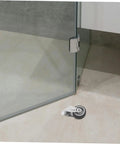 Heavy Duty Sliding Door Guide Wheel And Caster Kit With Bottom Floor Guide For Barn Doors And Gates Grey Metal Plastic Antisag Design close-up on floor.
