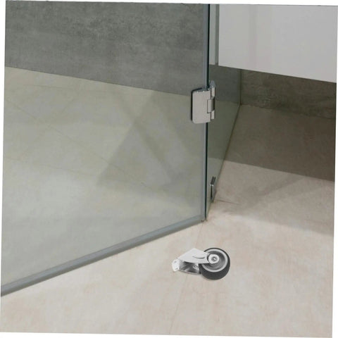 Heavy Duty Sliding Door Guide Wheel And Caster Kit With Bottom Floor Guide For Barn Doors And Gates Grey Metal Plastic Antisag Design close-up on floor.