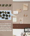 Badass Bronze Upholstery Tacks 50 Pack Square Head Bubble Nails For Furniture Crafting Decorative Thumb Tacks With Vintage Polish displayed on a cork board.