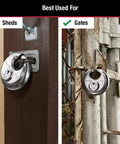 Stainless Steel Discus Padlock With Key Two And Three Quarter Inch Wide 40DPF shown on shed and gate for secure locking