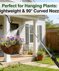 Stainless Steel Watering Wand Sprayer For Garden Hose used on hanging plant, showing 90 degree reach and lightweight design