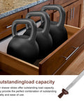 Premium Heavy Duty Center Mount And Undermount Drawer Slides Keeping Your Drawers Gliding Smooth Zero Fuss Hardware Replacement For Dressers Cabinets And Nightstands with kettlebells in a wooden drawer.