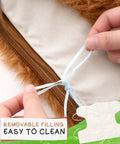 Hands showing removable filling of Weighted Highland Cow Lap Pad For Relaxation And Chill, 5lb Sensory Plush Blanket.