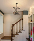 Black 4-Light Farmhouse Chandelier Pendant Light For Dining Room Hallway Kitchen Island Living Room Bedroom, Adjustable Lantern Fixture, 12.6-Inch Lit Lantern Pendant hanging in hallway
