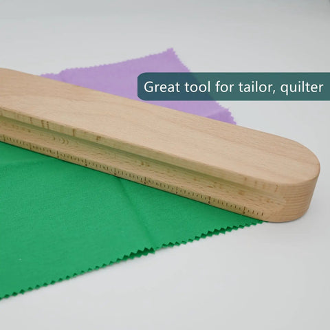 Wooden Clapper Tool For Pro Sewing And Quilting Nine Point Five Inch Hardwood Ironing Clapper shown on fabric