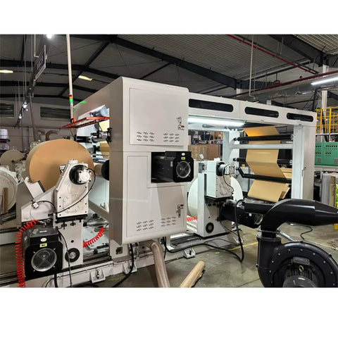 Industrial Smooth Operation Heavy Duty Automatic Jumbo Roll Slitter Machine Featuring Differential Slip Shaft For Insulation Paper Sheets and job ready site setup in factory.