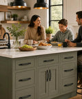 Family enjoying breakfast around kitchen island with cabinets featuring Beefy 11 Inch Flat Iron Handle Black Wrought Iron Vintage Finish.