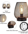 Close-up of Set Of 2 Metal Cage LED Lanterns Battery Powered Cordless Accent Lights For Indoors with brown mesh shade.