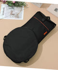 Road Ready Portable Dumb Drum Bag For Silent Practice Pad Storage In Slick Oxford Fabric on a beige surface with padded compartments.