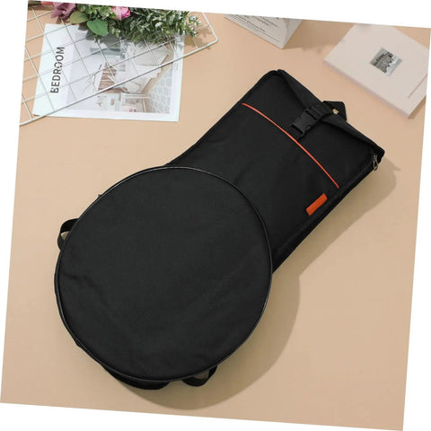 Road Ready Portable Dumb Drum Bag For Silent Practice Pad Storage In Slick Oxford Fabric on a beige surface with padded compartments.