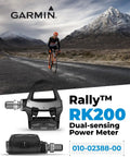 Cyclist on road with RK200 Dual Sensing Power Meter Pedals and Garmin branding, mountain background