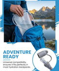 Person placing Go To 2L Hydration Bladder Kit With Cleaning Kit For Hiking Backpacks Trail Ready Leakproof BPA Free in a blue bag