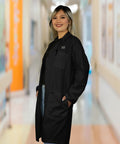Person wearing Personalized Black Lab Coat For Men And Women, Unisex Medical Lab Coat With Embroidery, 40 Inch Executive Length