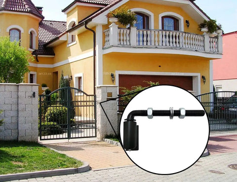 Built Like A Tank Universal Steel J Bolt Gate Hinge Smooth Swing Pivot With Ball Bearings Rust Proof Black Powder Coat in a driveway setting.