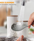 Ginger Grater Spoon And Lime Zester With Garlic Press And Wasabi Grinder under running water for quick cleaning