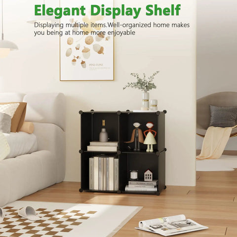 Four Cube Storage Organizer With Durable Plastic Modular Shelves in black finish, set up in a living room with decor items.
