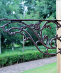 Premium Heavy Duty Cast Iron Wall Mount Shelf Brackets For Floating Shelves Rustic Industrial Triangle Corner Supports With Screws Built Like A Tank Two Pack side view with floral design