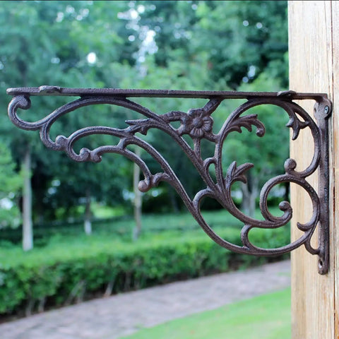 Premium Heavy Duty Cast Iron Wall Mount Shelf Brackets For Floating Shelves Rustic Industrial Triangle Corner Supports With Screws Built Like A Tank Two Pack side view with floral design