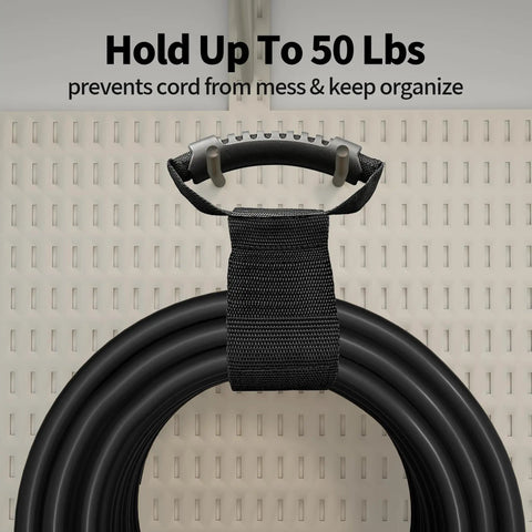 Heavy Duty 25 Foot Outdoor Extension Cord coiled with holder against a pegboard background