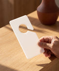 20 Pack Closet Dividers for Hanging Clothes Rectangle Thick Rigid Plastic 6.5x3.5 Inches Clear Garment Rack Dividers for Easy Size Organization and Retail Displays, held in hand
