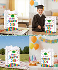 Preschool Graduation Gift Bags With Tissue Paper And Durable Handle 11 Inch My First Graduation Bags For Kids Kindergarten Pre K Boys And Girls Party Favors And Keepsake shown in classroom and outdoor settings.