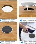Hassle Free Embedded Desk Wireless Charger With Recessed Grommet Mount, easy installation, aluminum build on wooden table.
