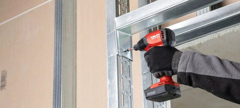 Worker using drill with Battery Pack B 12/2.6 for Cordless Systems 10.8V Replacement Power Pack for Tools