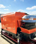 Field Ready Mini Concrete Pump Machine With Portable Hydraulic Setup And Plug And Play Vibrating Screen Filter For No Headache High Pressure Grouting On Any Real Deal Build Site viewed from the side showing compact design and mounted tires.