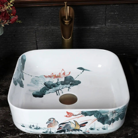 Square Sink Bowls For Bathroom,Ceramic Vessel Sink With Faucet And Drainer Above Counter White Porcelain Ceramic Vessel Vanity Sink With Flower featuring floral design and high-gloss finish.