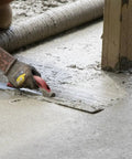 Worker using 24 Inch Beveled End Magnesium Hand Float With DuraSoft Handle And Cast Magnesium Blade For Slick, Pro Level Concrete Finishes