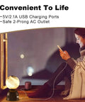 Woman using phone near Small Touch Bedside Table Lamp With USB Port And Outlet, farmhouse glass globe, on window ledge.