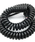 Heavy Duty Three Core Coiled Extension Cord With No Fuss Spring Design Black Power Cable coiled for easy storage and use.