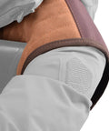Adjustable Rifle And Shotgun Field Shield Recoil Pad With Leather Shirt Vest close-up on shoulder, cushioned kickback reduction gear