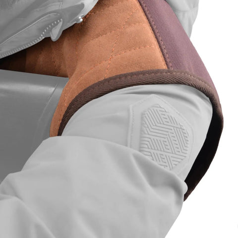 Adjustable Rifle And Shotgun Field Shield Recoil Pad With Leather Shirt Vest close-up on shoulder, cushioned kickback reduction gear