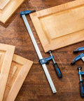 18 Inch Sure Foot F Style Clamp With No Tip Base for hands-free woodworking with light wood panels on workbench