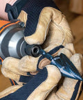 Heavy Duty Step Drill Bit With Quick Release Spiral Flutes And Hex Shank held in hand, showing detailed grip and design for easy metal cutting.