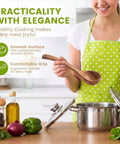 Premium Italian Olive Wood Ladle Kitchen Spoon That Totally Slaps With 12 Inch Long Handle And Deep Bowl Head For Cooking Soup, in use stirring a pot.