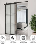 Three Panel Glass Sliding Barn Door 30x84 Inches, Black Aluminum Frame With Clear Tempered Glass partially open in bedroom