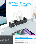 Straight Up Solid Desk Clamp Power Strip With Nine AC Outlets And Eight USB Ports For Stacked 40W Fast Charging Built Different For Heavy Duty Home Office Use with USB-C chargers.