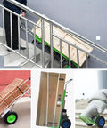 Ultra Heavy Duty Electric Stair Climbing Hand Truck navigating stairs with wood crates, featuring sturdy aluminum alloy frame.
