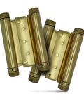Tough As Nails Heavy Duty Double Action Hinges For Saloon Cafe Bar Swing Doors Polished Brass Commercial Self Closing Hardware Adjustable Spring Tension Smooth Two Way Open No Sweat Install Pair Of Two Pack, showing polished brass finish and sturdy design.